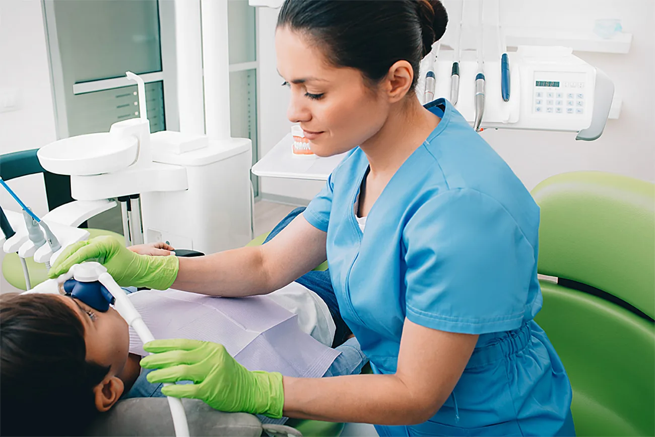 Dental professional examining a patient