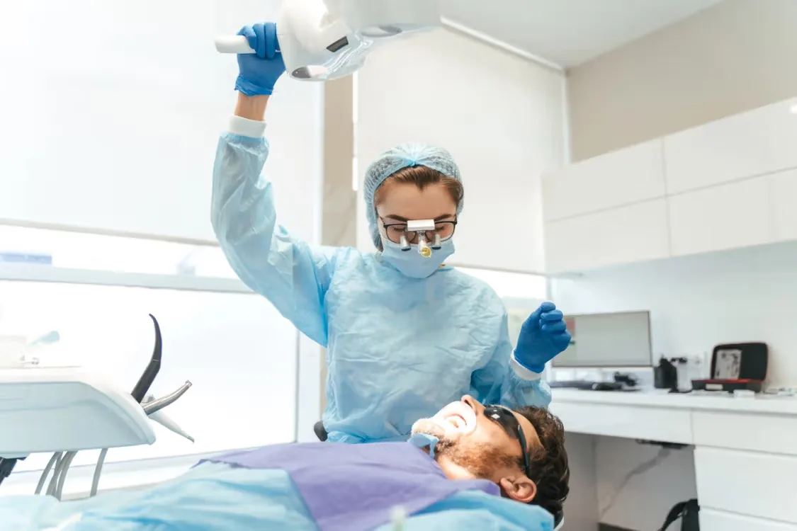 Dental team treating a patient