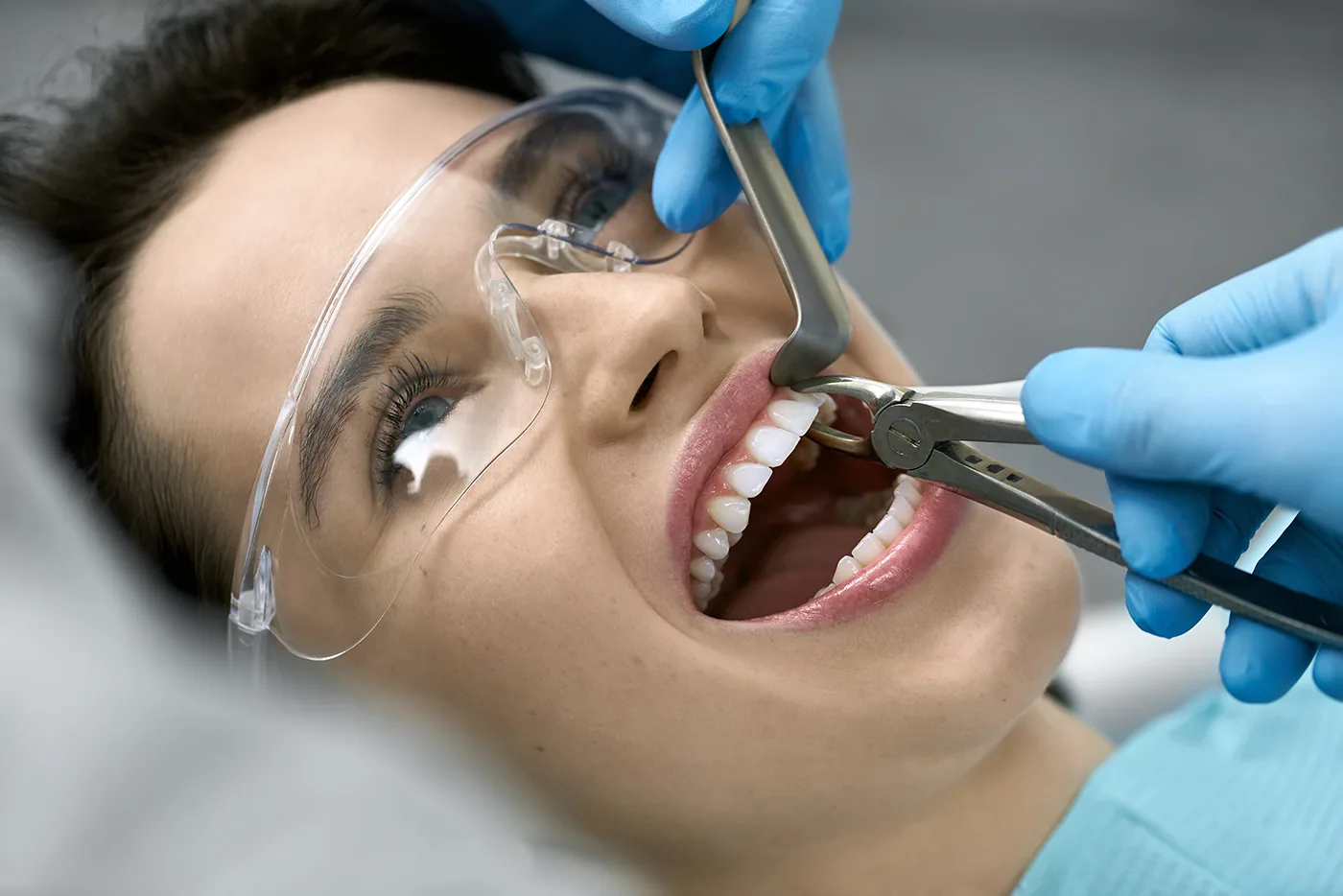 Dentist examining a patient’s teeth